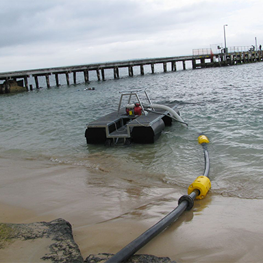 how to dredge around a dock using a pump